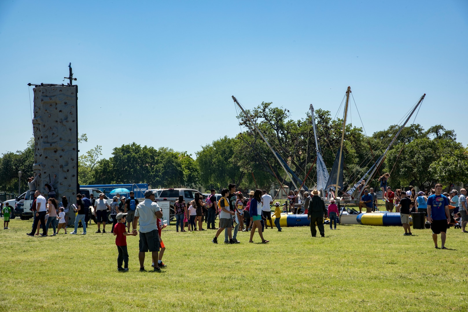 Families check out the attractions April 20, 2019, at Joint Base San Antonio-Fort Sam Houston, Texas during the Fiesta and Fireworks Extravaganza. Fiesta honors the long-standing partnership between the U.S. military and San Antonio in annual Fiesta events, which commemorate Texas’ independence after the Battle of San Jacinto and the Alamo.  (U.S. Air Force photo by Senior Airman Stormy Archer)