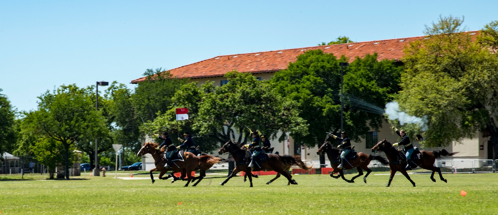 Soldiers demonstrate a cavalry charge April 20, 2019, at Joint Base San Antonio-Fort Sam Houston, Texas during the Fiesta and Fireworks Extravaganza. Fiesta honors the long-standing partnership between the U.S. military and San Antonio in annual Fiesta events, which commemorate Texas’ independence after the Battle of San Jacinto and the Alamo.  (U.S. Air Force photo by Senior Airman Stormy Archer)