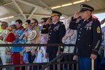 Lt. Gen. Jeffrey S. Buchanan, U.S. Army North commander, and Command Sergeant Major Alberto Delgado, U.S. Army North command sergeant major, salute during the playing of the National Anthem April 20, 2019, at Joint Base San Antonio-Fort Sam Houston, Texas during the Fiesta and Fireworks Extravaganza. Fiesta honors the long-standing partnership between the U.S. military and San Antonio in annual Fiesta events, which commemorate Texas’ independence after the Battle of San Jacinto and the Alamo.  (U.S. Air Force photo by Senior Airman Stormy Archer)