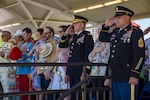 Lt. Gen. Jeffrey S. Buchanan, U.S. Army North commander, and Command Sergeant Major Alberto Delgado, U.S. Army North command sergeant major, salute during the playing of the National Anthem April 20, 2019, at Joint Base San Antonio-Fort Sam Houston, Texas during the Fiesta and Fireworks Extravaganza. Fiesta honors the long-standing partnership between the U.S. military and San Antonio in annual Fiesta events, which commemorate Texas’ independence after the Battle of San Jacinto and the Alamo.  (U.S. Air Force photo by Senior Airman Stormy Archer)