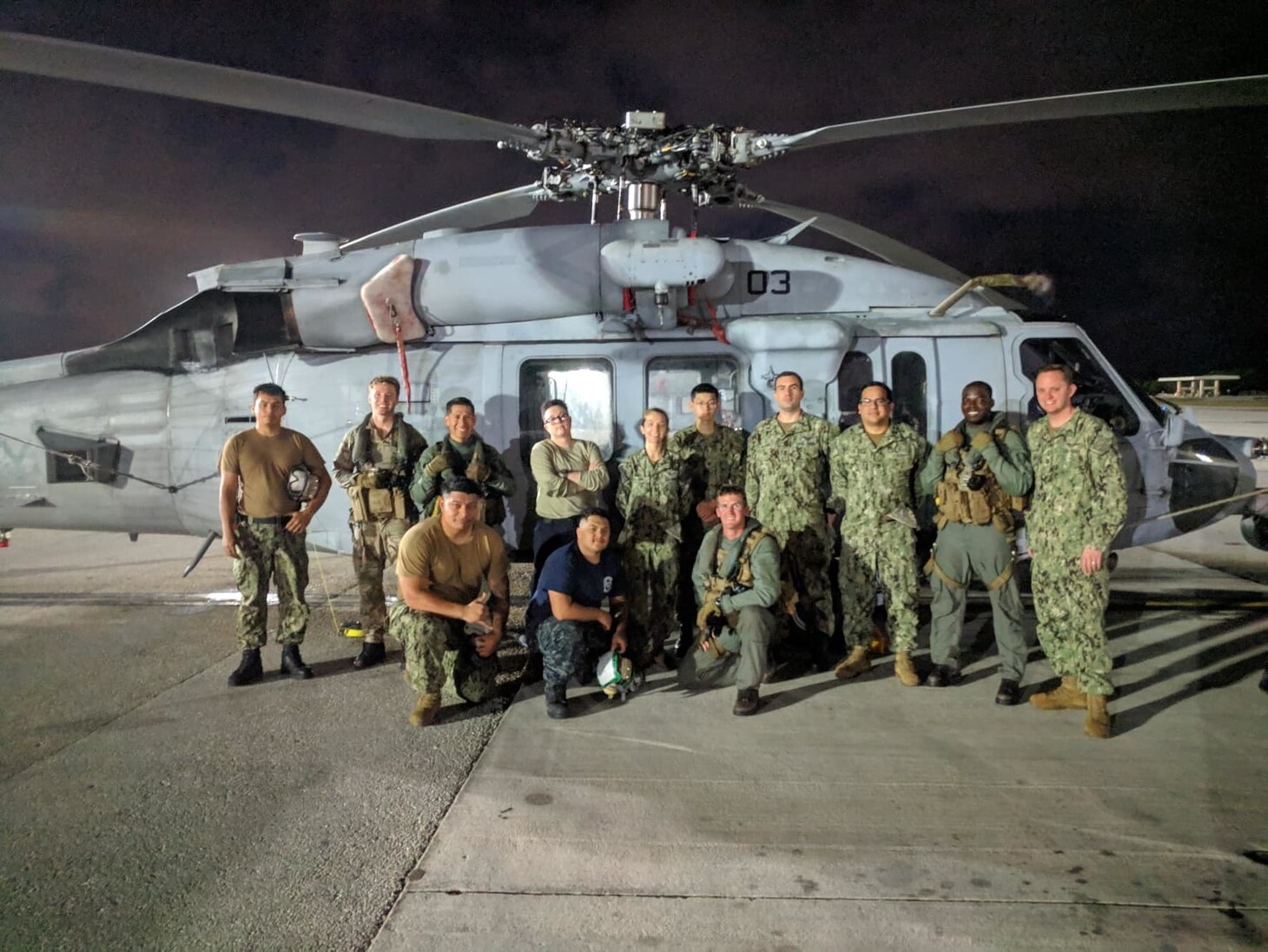 Sailors assigned to the “Island Knights” of Helicopter Sea Combat Squadron (HSC) 25 pose for a photo after providing aerial firefighting for southern Guam, along the northeastern edge of the Naval Magazine, when a brush fire quickly began to spread and threaten local homes of Santa Rita and was successfully contained using 4200 gallons of water. HSC-25 provides a multi-mission rotary wing capability for units in the U.S. 7th Fleet area of operations and maintains a Guam-based 24-hour search and rescue and medical evacuation capability, directly supporting U.S. Coast Guard and Joint Region Marianas. HSC-25 is the Navy’s only forward-deployed MH-60S expeditionary squadron.