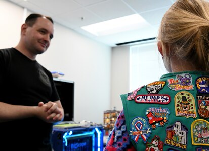 Cody Jackson, 90th Cyberspace Operations Squadron constructive modeler, hosts a “Bricks in the Loop” tour for local Girl Scouts at Joint Base San Antonio-Lackland April 19. “Bricks in the Loop” mimics an Air Force installation with items such as a fire station, police station, airport, jets and tanker trucks, all used to simulate real-world cyber systems in training cyber operators.