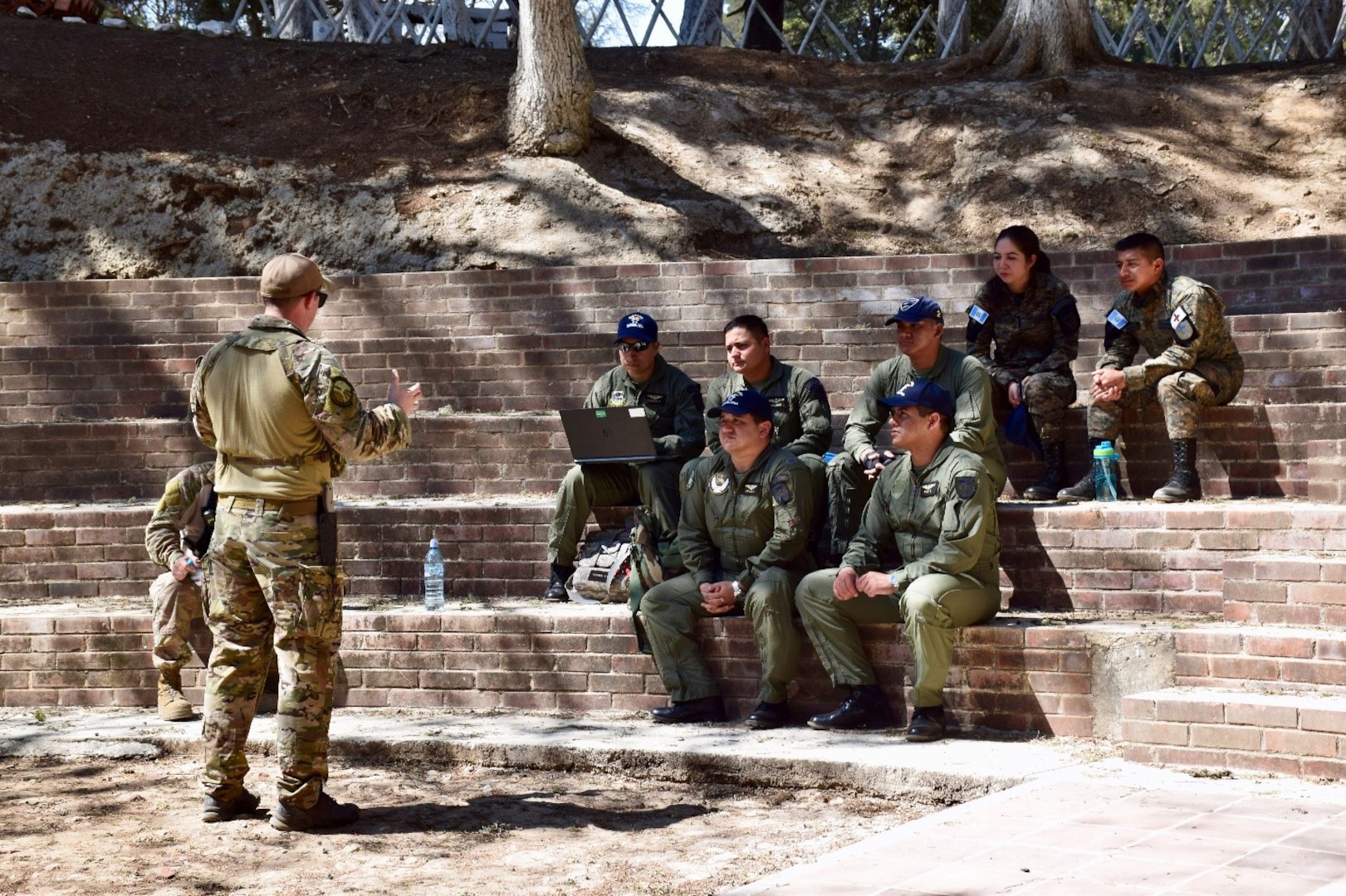 Tech. Sgt. Joseph Dittmer, 571st Mobility Support Advisory Squadron air advisor, leads the classroom portion of the aircrew survival course with the Guatemalan air force at Cobra Camp in the Army Mariscal Zavala Army Base, Guatemala. This seminar was a great opportunity to not only learn about potentially life-saving strategies in case of a mishap, but also build teamwork between the newly minted Guatemalan aeromedical evacuation technicians and the helicopter pilots. (Courtesy Photo)