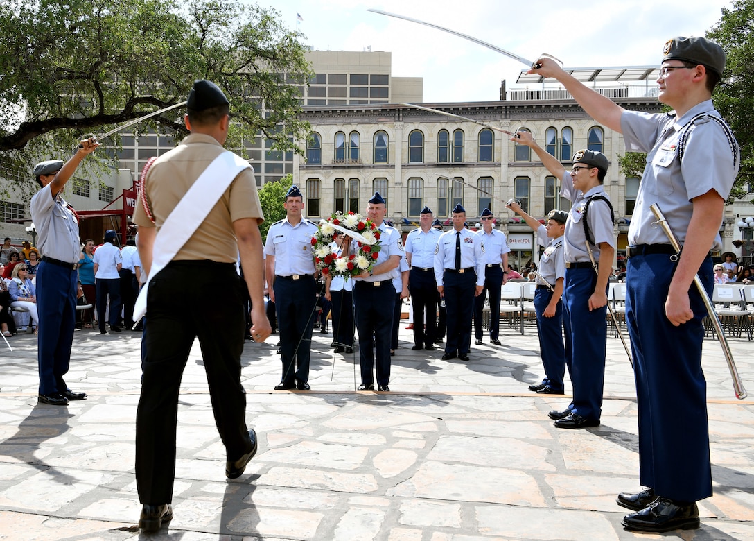Maj. Gen. Robert Skinner, 24th Air Force commander, and Chief Master Sgt. David Klink, 24th AF command chief, present the 24th Air Force wreath during the Fiesta San Antonio “Pilgrimage to the Alamo” on April 22, 2019. Fiesta San Antonio is held annually to honor those who lost their lives at the Alamo and Battle of San Jacinto. (U.S. Air Force photo by Tech. Sgt. R.J. Biermann)