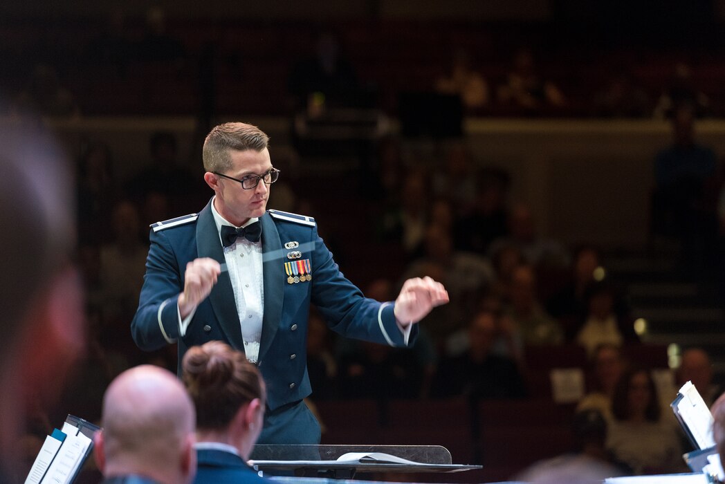 First Lieutenant Phillip Emory conducts the Concert Band on Apr. 18, during the final concert of The U.S. Air Force Band's 2019 Guest Artist Series. The concert featured internationally acclaimed saxophonist Joe Lulloff.