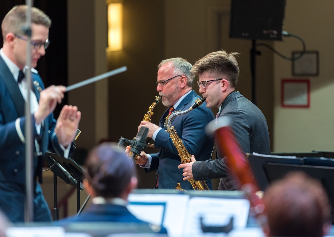 Internationally acclaimed saxophonist Joe Lulloff plays alongside his son, Jordan Lulloff, as they perform with the U.S. Air Force Concert Band on Thursday, Apr. 18 at the Rachel M. Schlesinger Concert Hall and Arts Center in Alexandria, Virginia. This concert was the final installment of The U.S. Air Force Band's 2019 Guest Artist Series. (U.S. Air Force photo by Master Sgt. Grant Langford)