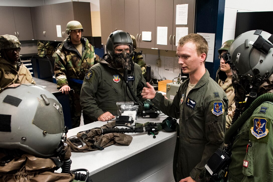 Airmen from the 71st Rescue Squadron are given flight instructions for in-flight patient care training during exercise FT 19-04, April 18, 2019, at Moody Air Force Base, Ga. The training involved performing a medical evacuation and recovering simulated-wounded personnel from Maxwell Air Force Base, Ala., followed by doing in-flight patient care for multiple categories of wounds. The exercise focused on high operations tempo and the ability to survive and operate in a chemical, biological, radioactive and nuclear environment to meet Chief of Staff of the Air Force and the Commander of Air Combat Command’s intent for readiness. (U.S. Air Force photo by Senior Airman Erick Requadt)