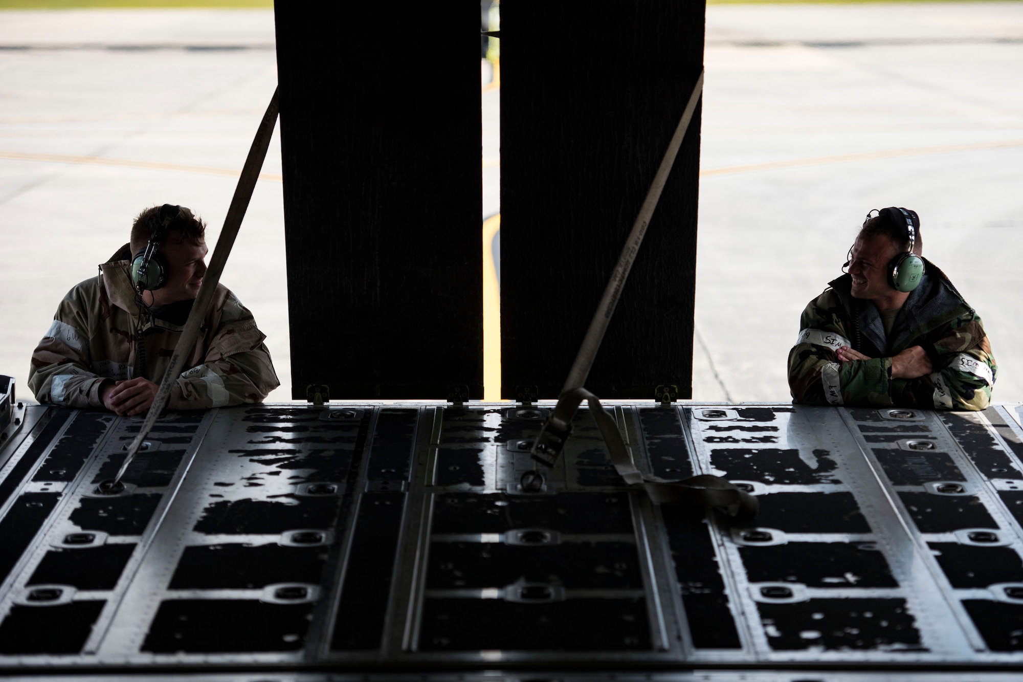 Airmen from the 71st Aircraft Maintenance Unit share a smile during in-flight patient care training during exercise FT 19-04, April 18, 2019, at Moody Air Force Base, Ga. The training involved performing a medical evacuation and recovering simulated-wounded personnel from Maxwell Air Force Base, Ala., followed by doing in-flight patient care for multiple categories of wounds. The exercise focused on high operations tempo and the ability to survive and operate in a chemical, biological, radioactive and nuclear environment to meet Chief of Staff of the Air Force and the Commander of Air Combat Command’s intent for readiness. (U.S. Air Force photo by Senior Airman Erick Requadt)