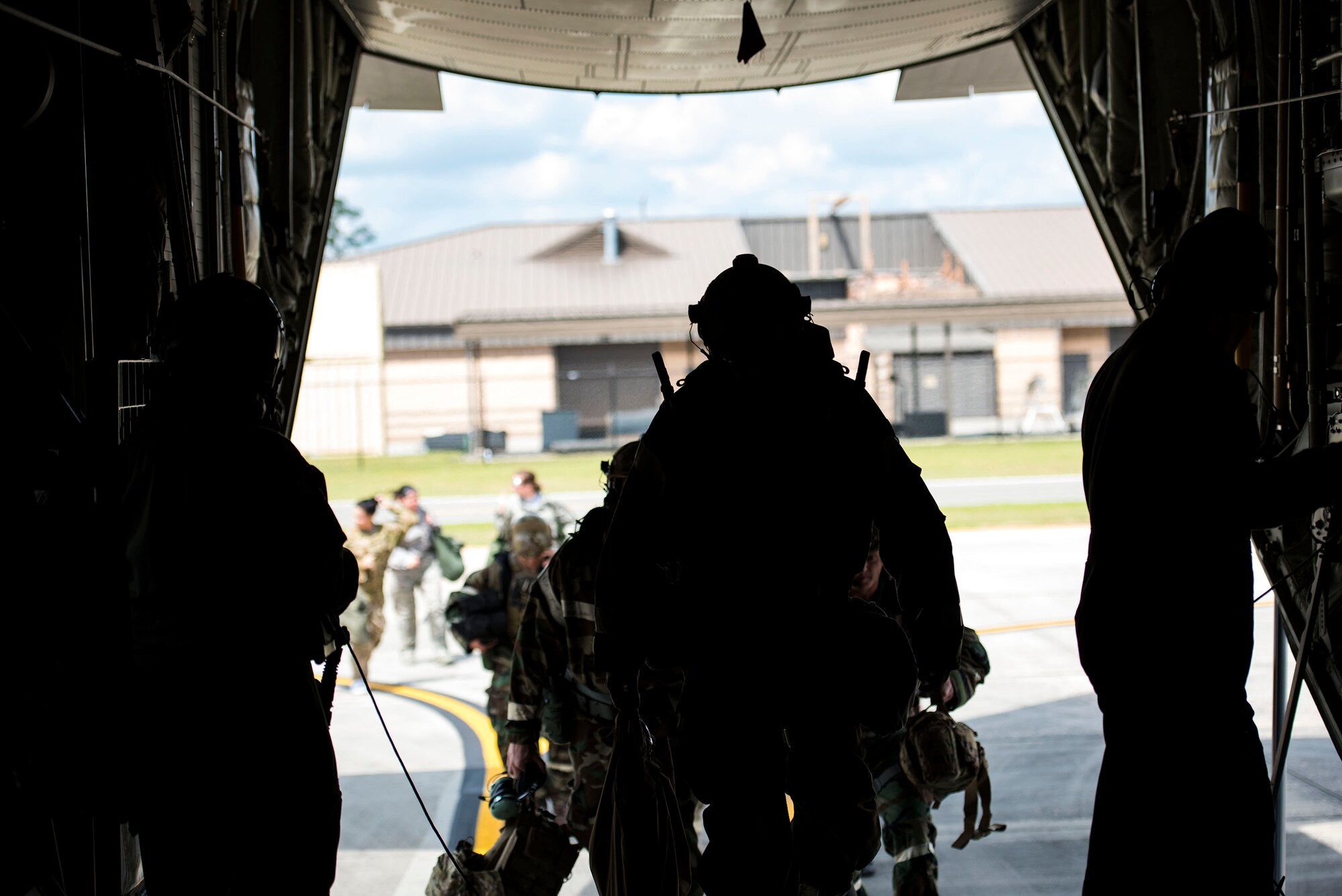 Airmen from the 347th Rescue Group load into an HC-130J Combat King II for in-flight patient care training during exercise FT 19-04, April 18, 2019, at Moody Air Force Base, Ga. The training involved performing a medical evacuation and recovering simulated-wounded personnel from Maxwell Air Force Base, Ala., followed by doing in-flight patient care for multiple categories of wounds. The exercise focused on high operations tempo and the ability to survive and operate in a chemical, biological, radioactive and nuclear environment to meet Chief of Staff of the Air Force and the Commander of Air Combat Command’s intent for readiness. (U.S. Air Force photo by Senior Airman Erick Requadt)