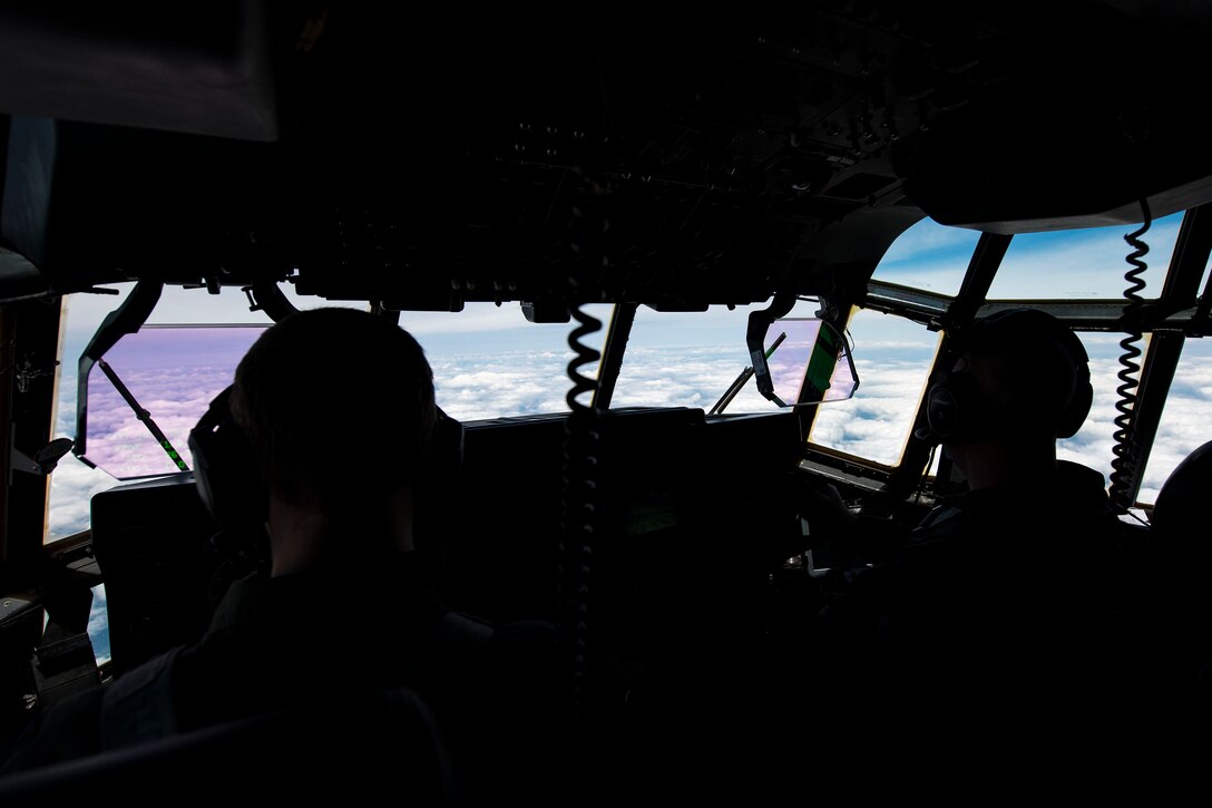Capt. Jacob Thoman, left, and Capt. Matthew Eddy, 71st Rescue Squadron pilots, fly to Maxwell Air Force Base, Ala. during in-flight patient care training during exercise FT 19-04, April 18, 2019. The training involved performing a medical evacuation and recovering simulated-wounded personnel from Maxwell, followed by doing in-flight patient care for multiple categories of wounds. The exercise focused on high operations tempo and the ability to survive and operate in a chemical, biological, radioactive and nuclear environment to meet Chief of Staff of the Air Force and the Commander of Air Combat Command’s intent for readiness. (U.S. Air Force photo by Senior Airman Erick Requadt)