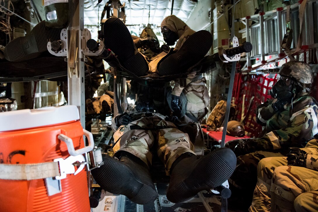 Simulated-wounded personnel rest on stretchers during in-flight patient care training during exercise FT 19-04, April 18, 2019, at Maxwell Air Force Base, Ala. The training involved performing a medical evacuation and recovering simulated-wounded personnel from Maxwell, followed by doing in-flight patient care for multiple categories of wounds. The exercise focused on high operations tempo and the ability to survive and operate in a chemical, biological, radioactive and nuclear environment to meet Chief of Staff of the Air Force and the Commander of Air Combat Command’s intent for readiness. (U.S. Air Force photo by Senior Airman Erick Requadt)