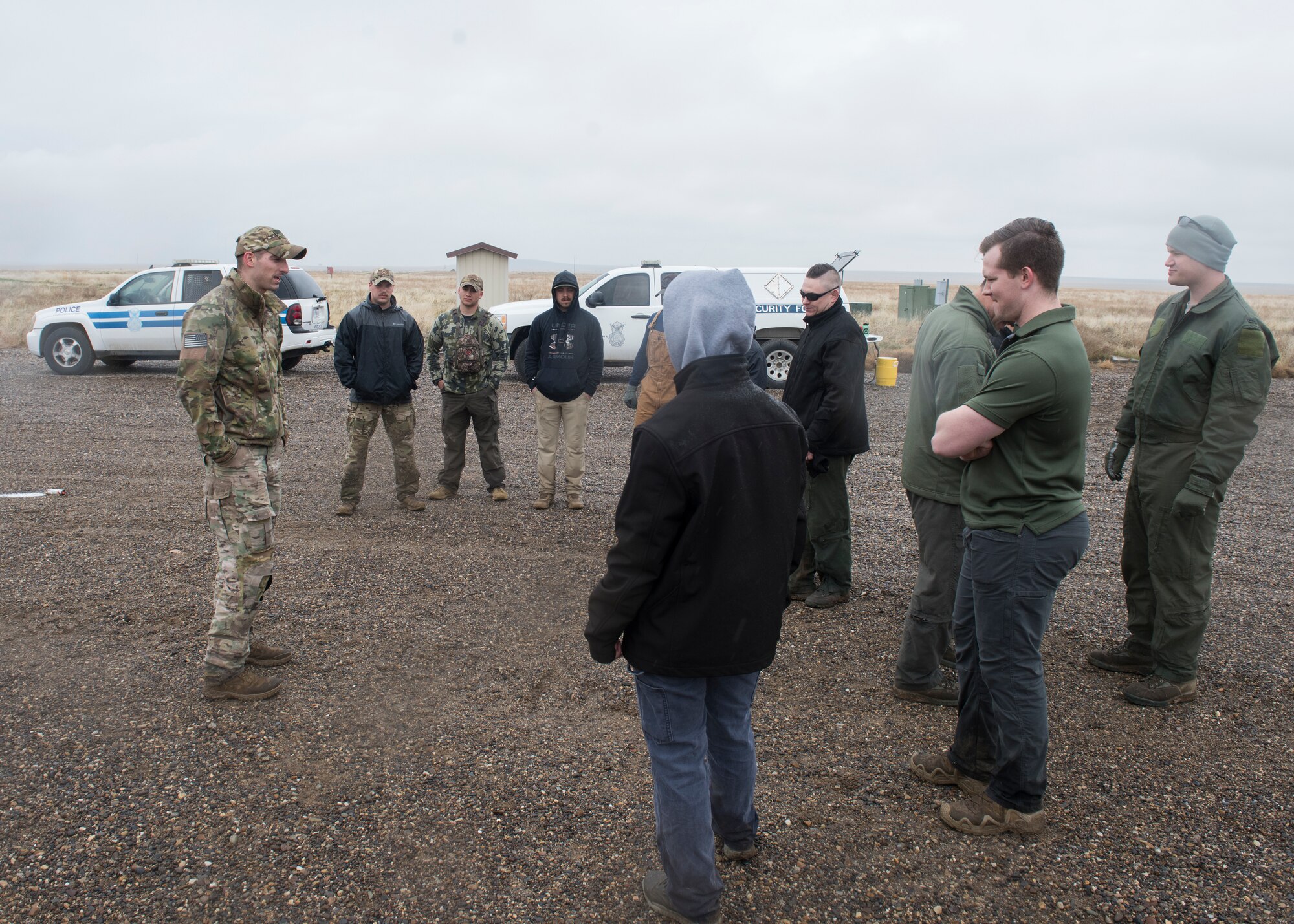 Staff Sergeant David H Chorpenning, 366th OSKP, briefs the team he organized for combat survival training after an exercise for Gunfighter Flag, March 2, 2019, at sailor creek range. Air crew from Mountain Home Air Force base underwent refresher training on evading capture and acquiring recovery from Combat Search and Rescue Personnel during Gunfighter Flag. (U.S. Air Force photo by Senior Airman Tyrell Hall)