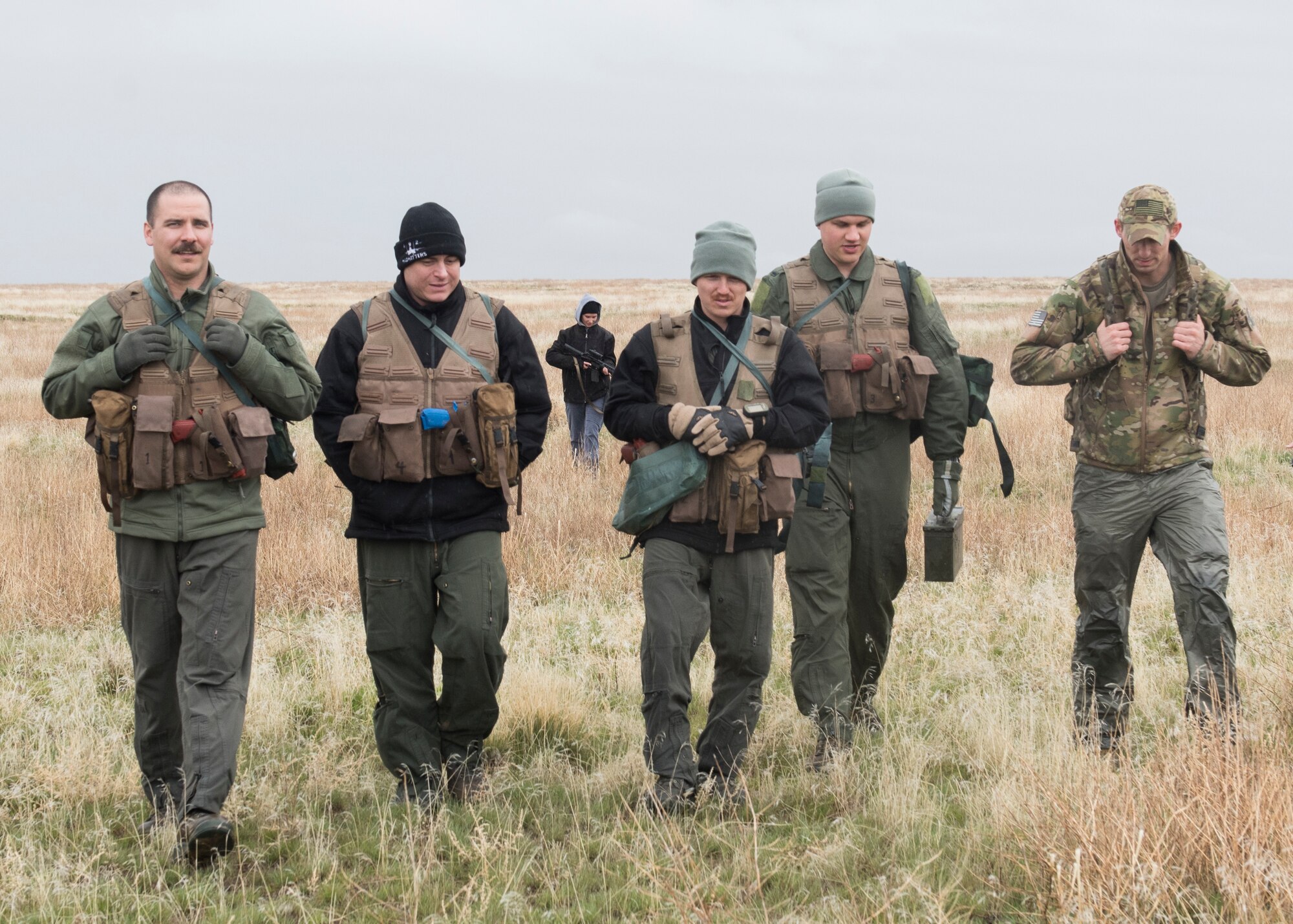 Staff Sergeant David H Chorpenning, 366th OSKP, walks with a team he organized for a combat survival training after an exercise for Gunfighter Flag, March 2, 2019. Air crew from Mountain Home Air Force base underwent refresher training on evading capture and acquiring recovery from Combat Search and Rescue Personnel during Gunfighter Flag. (U.S. Air Force photo by Senior Airman Tyrell Hall)