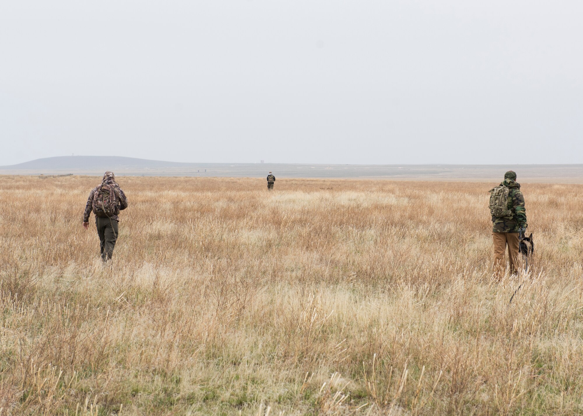366th Security Forces simulate searching for downed air crew during the Gunfighter Flag training exercise, March 2, 2019 at sailor creek range. Pilots from Mountain Home Air Force base underwent refresher training on evading capture and aquiring recovery from Combat Search and Rescue Personnel during Gunfighter Flag. (U.S. Air Force photo by Senior Airman Tyrell Hall)