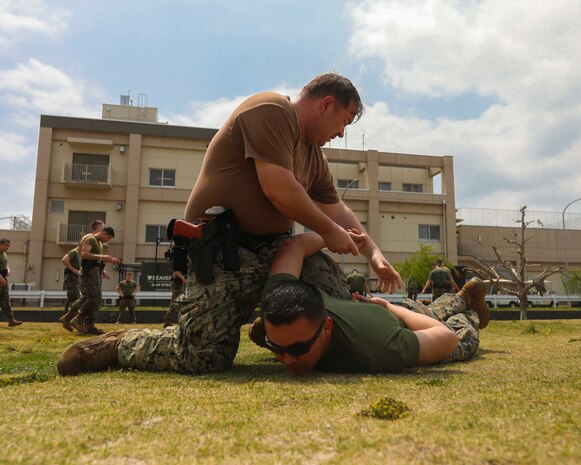 US service members conduct OC spray training at MCAS Iwakuni