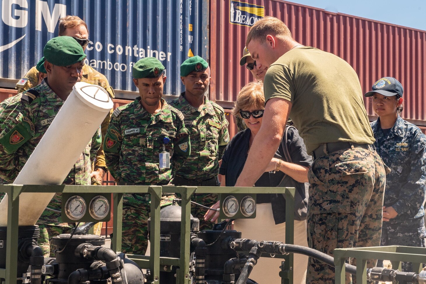 DILI, Timor-Leste (April 23, 2019) – U.S. Marine Corps L.Cpl. Taylor Carr explains the components of a lightweight water purification system to Kathleen Fitzpatrick, U.S. ambassador to Timor-Leste, and Timor-Leste Defense Force members during a subject matter expert exchange as part of Pacific Partnership 2019. Pacific Partnership, now in its 14th iteration, is the largest annual multinational humanitarian assistance and disaster relief preparedness mission conducted in the Indo-Pacific. Each year the mission team works collectively with host and partner nations to enhance regional interoperability and disaster response capabilities, increase security and stability in the region, and foster new and enduring friendships in the Indo-Pacific.