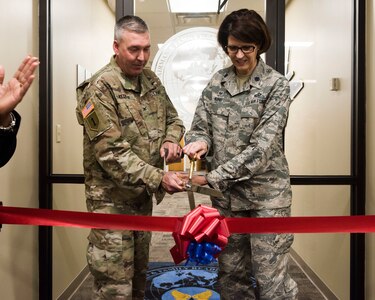 U.S. Army Col. Edward Vedder, 633rd Air Base Wing vice commander and U.S. Air Force Lt. Col. Laura King, 633rd ABW Force Support Squadron commander, cut the ribbon at the Airman and Family Readiness Center reopening at Joint Base Langley-Eustis, Virginia, April 19, 2019.