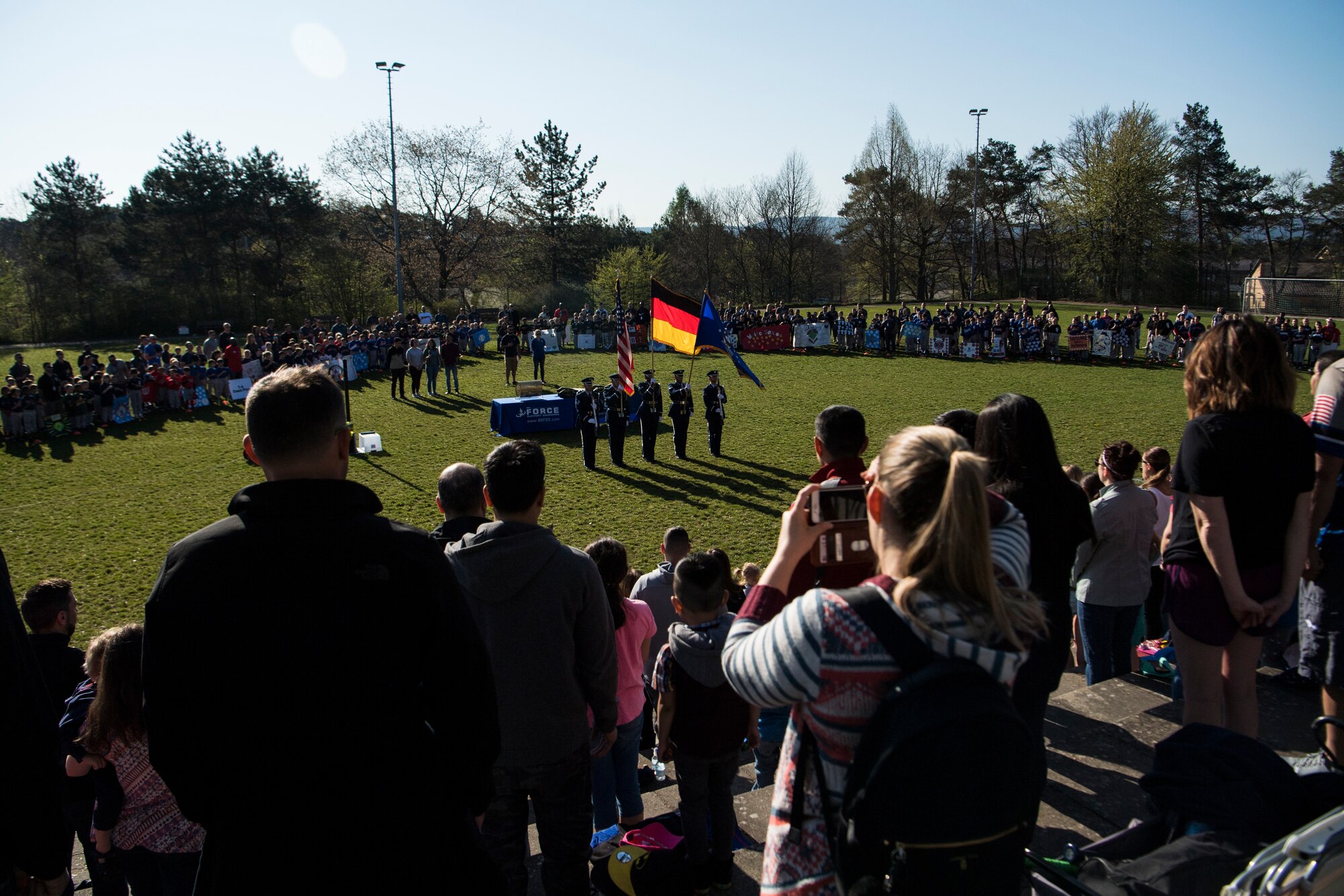 Brig. Gen. Mark R. August, 86th Airlift Wing commander gave opening remarks during the 2019 Spring Youth Sports kickoff opening day event on Ramstein Air Base, Germany, April 20, 2019.