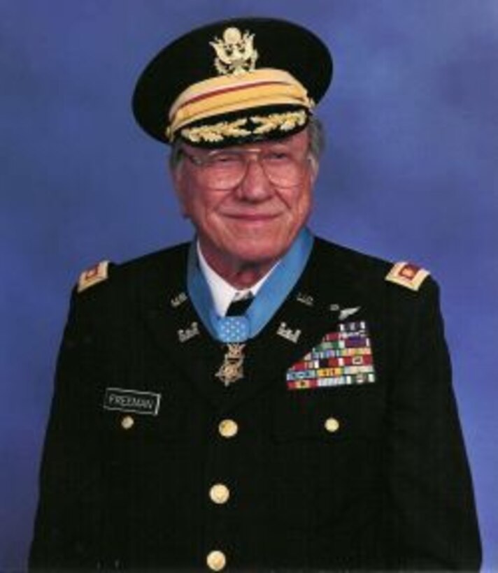 An official photo of a soldier in formal dress wearing a Medal of Honor.