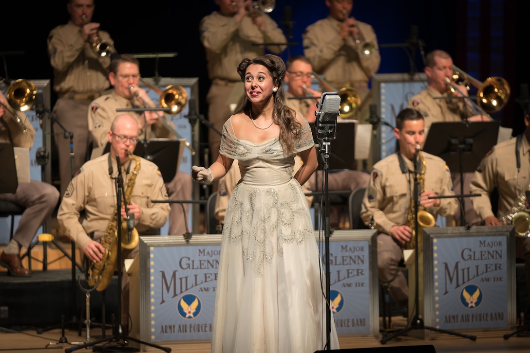 Acclaimed jazz vocalist Veronica Swift sings during "On the Air: A Glenn Miller Swing Celebration," a show featuring The U.S. Air Force Band performing the music of big band legend Major Glenn Miller on April 2, 2019, at the Music Center at Strathmore in North Bethesda, Maryland. The U.S. Air Force Band partnered with Washington Performing Arts to present this concert highlighting the legacy of Major Miller's music and his leadership of the Army Air Force Band. This year marks the 75th anniversary of the disappearance of Miller's plane during World War II. (U.S. Air Force Photo by Technical Sgt. Valentine Lukashuk)