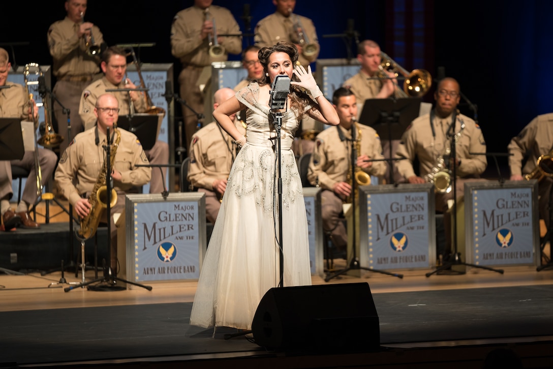 Acclaimed jazz vocalist Veronica Swift sings during "On the Air: A Glenn Miller Swing Celebration," a show featuring The U.S. Air Force Band performing the music of big band legend Major Glenn Miller on April 2, 2019, at the Music Center at Strathmore in North Bethesda, Maryland. The U.S. Air Force Band partnered with Washington Performing Arts to present this concert highlighting the legacy of Major Miller's music and his leadership of the Army Air Force Band. This year marks the 75th anniversary of the disappearance of Miller's plane during World War II. (U.S. Air Force Photo by Technical Sgt. Valentine Lukashuk)