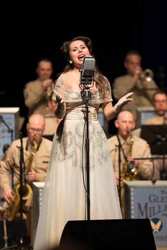 Acclaimed jazz vocalist Veronica Swift sings during "On the Air: A Glenn Miller Swing Celebration," a show featuring The U.S. Air Force Band performing the music of big band legend Major Glenn Miller on April 2, 2019, at the Music Center at Strathmore in North Bethesda, Maryland. The U.S. Air Force Band partnered with Washington Performing Arts to present this concert highlighting the legacy of Major Miller's music and his leadership of the Army Air Force Band. This year marks the 75th anniversary of the disappearance of Miller's plane during World War II. (U.S. Air Force Photo by Technical Sgt. Valentine Lukashuk)