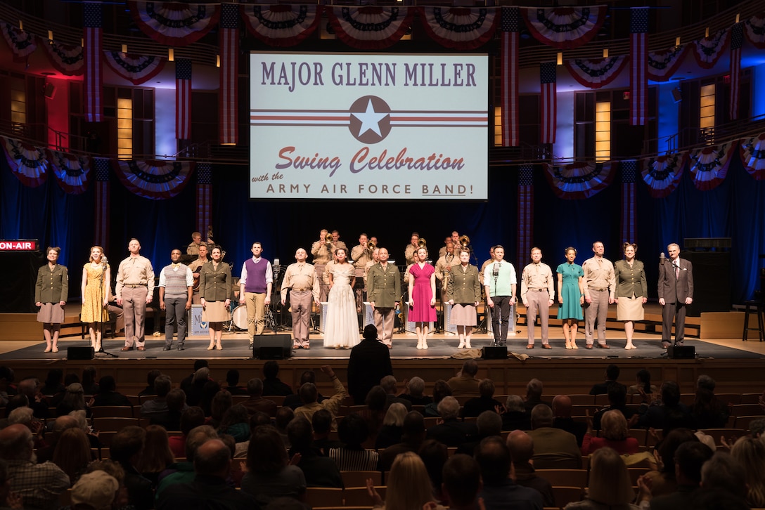 The entire cast comes onstage for the finale of "On the Air: A Glenn Miller Swing Celebration," a show featuring The U.S. Air Force Band performing the music of big band legend Major Glenn Miller on April 2, 2019, at the Music Center at Strathmore in North Bethesda, Maryland. The U.S. Air Force Band partnered with Washington Performing Arts to present this concert highlighting the legacy of Major Miller's music and his leadership of the Army Air Force Band. This year marks the 75th anniversary of the disappearance of Miller's plane during World War II. (U.S. Air Force Photo by Technical Sgt. Valentine Lukashuk)