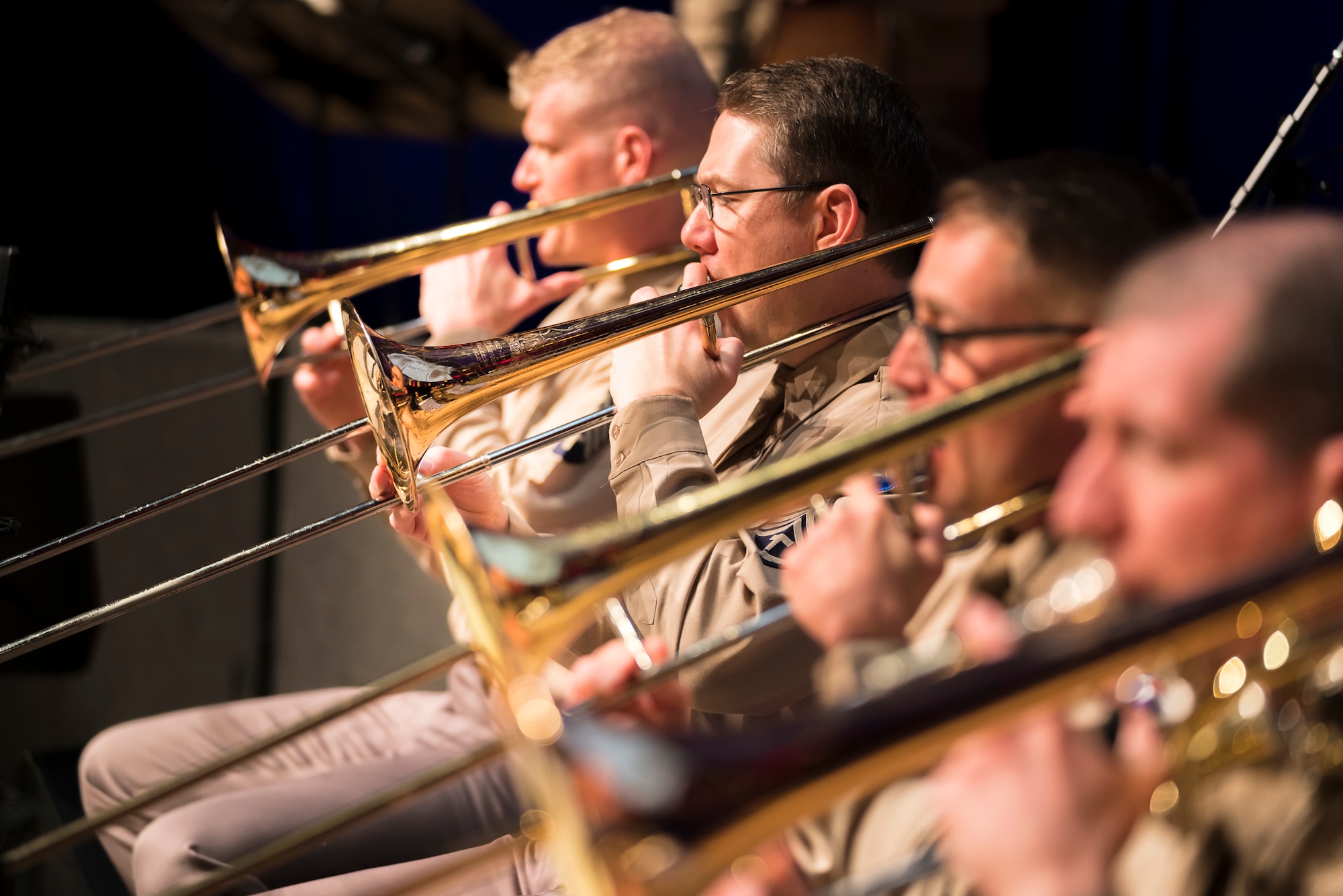 The trombone section performs during "On the Air: A Glenn Miller Swing Celebration," a show featuring The U.S. Air Force Band performing the music of big band legend Major Glenn Miller on April 2, 2019, at the Music Center at Strathmore in North Bethesda, Maryland. The U.S. Air Force Band partnered with Washington Performing Arts to present this concert highlighting the legacy of Major Miller's music and his leadership of the Army Air Force Band. This year marks the 75th anniversary of the disappearance of Miller's plane during World War II. (U.S. Air Force Photo by Master Sgt. Josh Kowalsky)