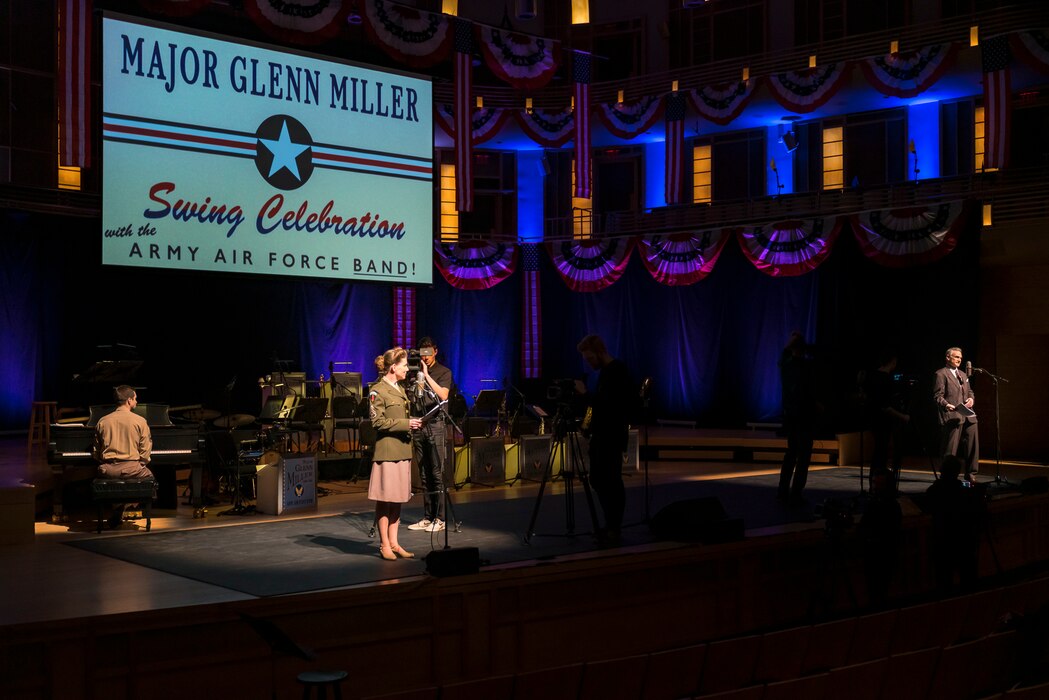 Washington Performing Arts Artist-in-Residence (and host of WAMU’s The Big Broadcast) Murray Horwitz (right) serves as emcee as Master Sgt. Brooke Emory (left) waits for the next cue during The U.S. Air Force Band's concert featuring the music of big band legend Major Glenn Miller on April 2, 2019, at the Music Center at Strathmore in North Bethesda, Maryland. The U.S. Air Force Band partnered with Washington Performing Arts to present this concert highlighting the legacy of Major Miller's music and his leadership of the Army Air Force Band. This year marks the 75th anniversary of the disappearance of Miller's plane during World War II. (U.S. Air Force Photo by Master Sgt. Josh Kowalsky)