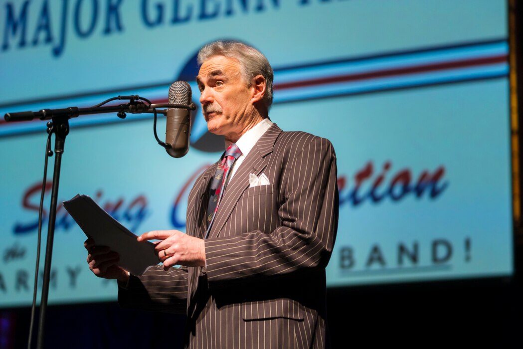Washington Performing Arts Artist-in-Residence (and host of WAMU’s The Big Broadcast) Murray Horwitz serves as emcee during The U.S. Air Force Band's concert featuring the music of big band legend Major Glenn Miller on April 2, 2019, at the Music Center at Strathmore in North Bethesda, Maryland. The U.S. Air Force Band partnered with Washington Performing Arts to present this concert highlighting the legacy of Major Miller's music and his leadership of the Army Air Force Band. This year marks the 75th anniversary of the disappearance of Miller's plane during World War II. (U.S. Air Force Photo by Master Sgt. Josh Kowalsky)