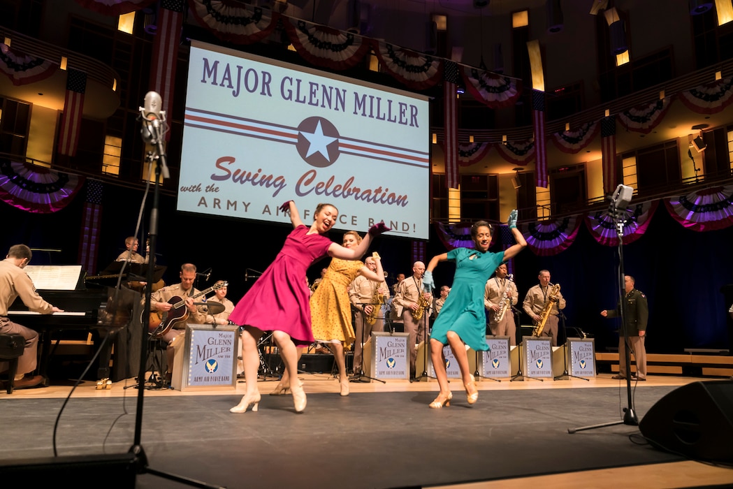 Members of The U.S. Air Force Band perform the music of big band legend Major Glenn Miller as dancers take center stage on April 2, 2019, at the Music Center at Strathmore in North Bethesda, Maryland. The U.S. Air Force Band partnered with Washington Performing Arts to present this concert highlighting the legacy of Major Miller's music and his leadership of the Army Air Force Band. This year marks the 75th anniversary of the disappearance of Miller's plane during World War II. (U.S. Air Force Photo by Master Sgt. Josh Kowalsky)