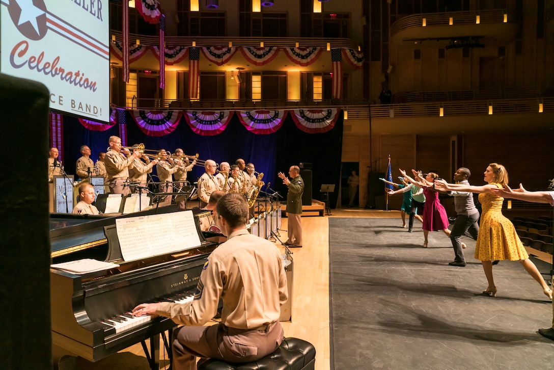 Members of The U.S. Air Force Band perform the music of big band legend Major Glenn Miller as dancers take center stage on April 2, 2019, at the Music Center at Strathmore in North Bethesda, Maryland. The U.S. Air Force Band partnered with Washington Performing Arts to present this concert highlighting the legacy of Major Miller's music and his leadership of the Army Air Force Band. This year marks the 75th anniversary of the disappearance of Miller's plane during World War II. (U.S. Air Force Photo by Master Sgt. Josh Kowalsky)