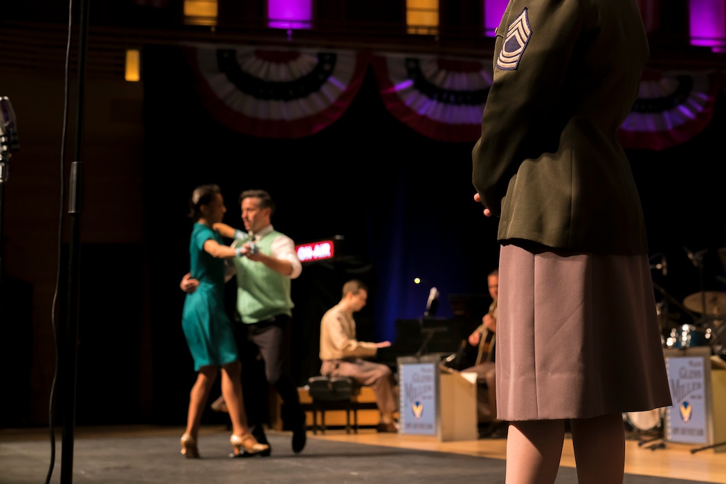 Members of The U.S. Air Force Band perform the music of big band legend Major Glenn Miller as dancers take center stage on April 2, 2019, at the Music Center at Strathmore in North Bethesda, Maryland. The U.S. Air Force Band partnered with Washington Performing Arts to present this concert highlighting the legacy of Major Miller's music and his leadership of the Army Air Force Band. The concert honored the 75th anniversary of the disappearance of Miller's plane over the English Channel during World War II. (U.S. Air Force Photo by Master Sgt. Josh Kowalsky)