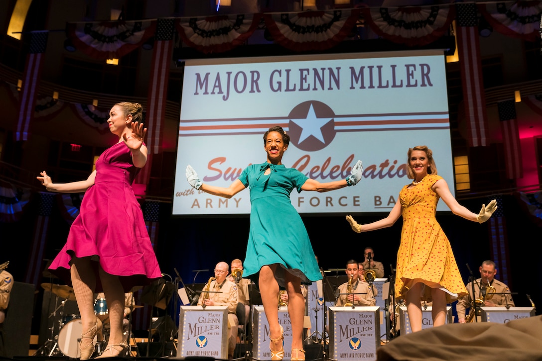 Members of The U.S. Air Force Band perform the music of big band legend Major Glenn Miller as professional dancers take center stage on April 2, 2019, at the Music Center at Strathmore in North Bethesda, Maryland. The U.S. Air Force Band partnered with Washington Performing Arts to present this concert highlighting the legacy of Major Miller's music and his leadership of the Army Air Force Band. This year marks the 75th anniversary of the disappearance of Miller's plane during World War II. (U.S. Air Force Photo by Master Sgt. Josh Kowalsky)