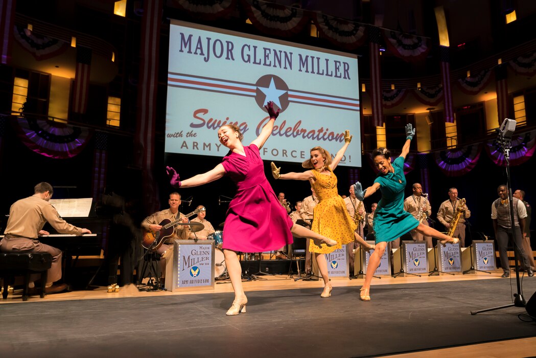 Members of The U.S. Air Force Band perform the music of big band legend Major Glenn Miller as professional dancers take center stage on April 2, 2019, at the Music Center at Strathmore in North Bethesda, Maryland. The U.S. Air Force Band partnered with Washington Performing Arts to present this concert highlighting the legacy of Major Miller's music and his leadership of the Army Air Force Band. This year marks the 75th anniversary of the disappearance of Miller's plane during World War II. (U.S. Air Force Photo by Master Sgt. Josh Kowalsky)