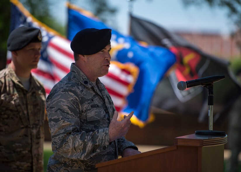 U.S. Air Force Lt. Col. Leo Martin, 633rd Security Forces commander speaks during a retirement ceremony in honor of U.S. Air Force Military Working Dog Max, 633rd Security Forces Squadron explosives detector at Joint Base Langley-Eustis, Virginia, April 23, 2019.