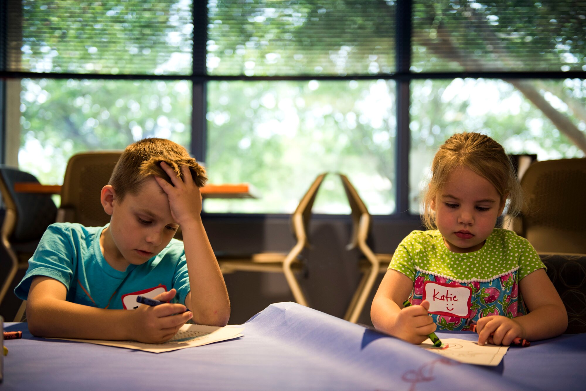 Participants draw during a deployed spouse dinner, April 23, 2019, at Moody Air Force Base, Ga. The dinner served as an opportunity for the families of deployed members to bond and provide relief. The mission’s success depends on resilient Airmen and families, who are prepared to make sacrifices with the support of their fellow Airmen, local communities and leadership. (U.S. Air Force photo by Senior Airman Erick Requadt)