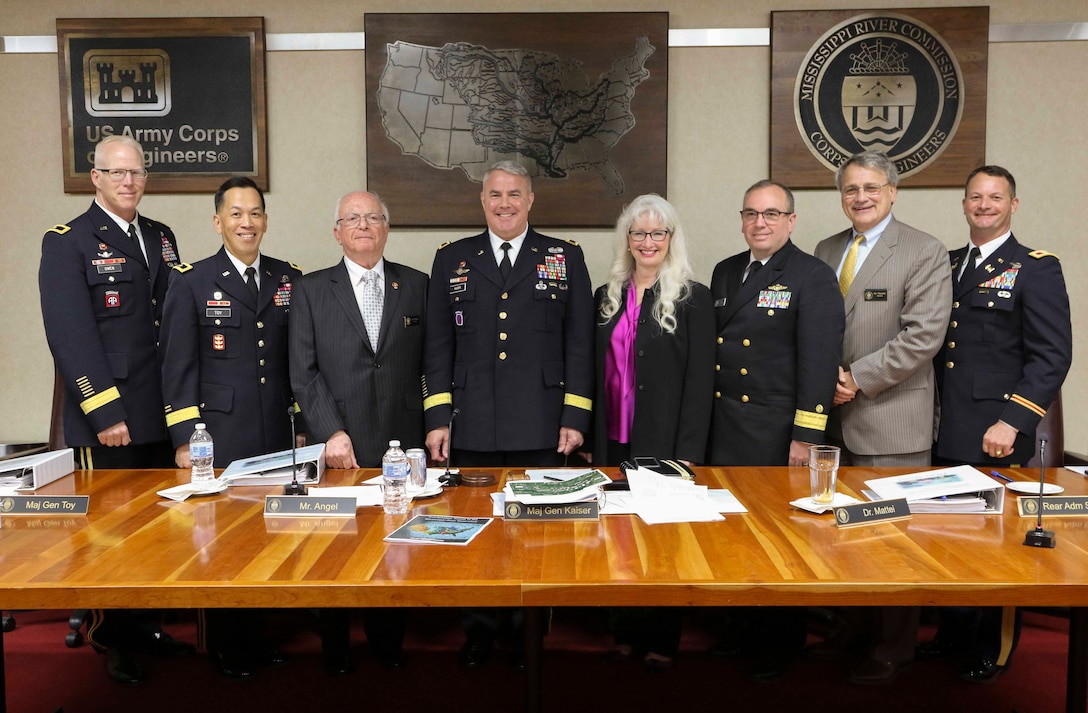 Mississippi River Commission members, Brig. Gen. Paul E. Owen, U.S. Army Corps of Engineers Southwestern Division commander; Maj. Gen. Mark Toy USACE Great Lakes and Ohio River Division commander; Hon. Sam E. Angel, civilian member, Maj. Gen. Richard G. Kaiser, MRC president; Hon. Norma Jean Mattei, Ph.D., civilian member/civil engineer; Rear Adm. Shepard Smith, with the National Oceanic and Atmospheric Administration; Hon. James A. Reeder, civilian member/civil engineer; and Col. Robert A. Hilliard, MRC secretary, stand aboard the MV Mississippi in Memphis, Tenn., April 9, 2019.