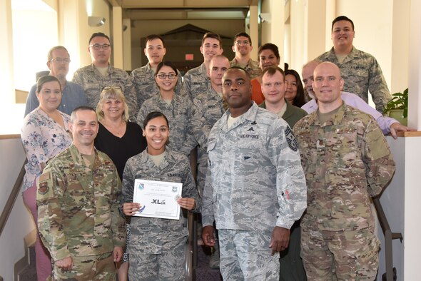 Airman 1st Class Arial Taylor, a 47th Comptroller Squadron commander support staff administration journeyman, was chosen by wing leadership to be the “XLer” of the week, for the week of April 17, 2019, at Laughlin Air Force Base, Texas. The “XLer” award, presented by Col. Lee Gentile, 47th Flying Training Wing commander, is given to those who consistently make outstanding contributions to their unit and the Laughlin mission. (U.S. Air Force photo by Senior Airman John A. Crawford)