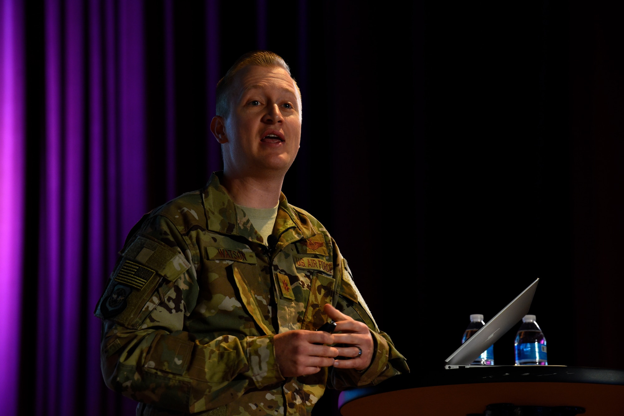 U.S. Air Force Maj. Mark Watson, 92nd Operations Group chief of training, presents a case study on creating an innovative culture during the 2019 Leaders Inspiring for Tomorrow summit in the base theater at Fairchild Air Force Base, Washington, April 19, 2019. LIFT is an engaging showcase that highlights numerous speakers, sharing their stories of inspiration, innovation, character and leadership. (U.S. Air Force photo by Airman 1st Class Lawrence Sena)
