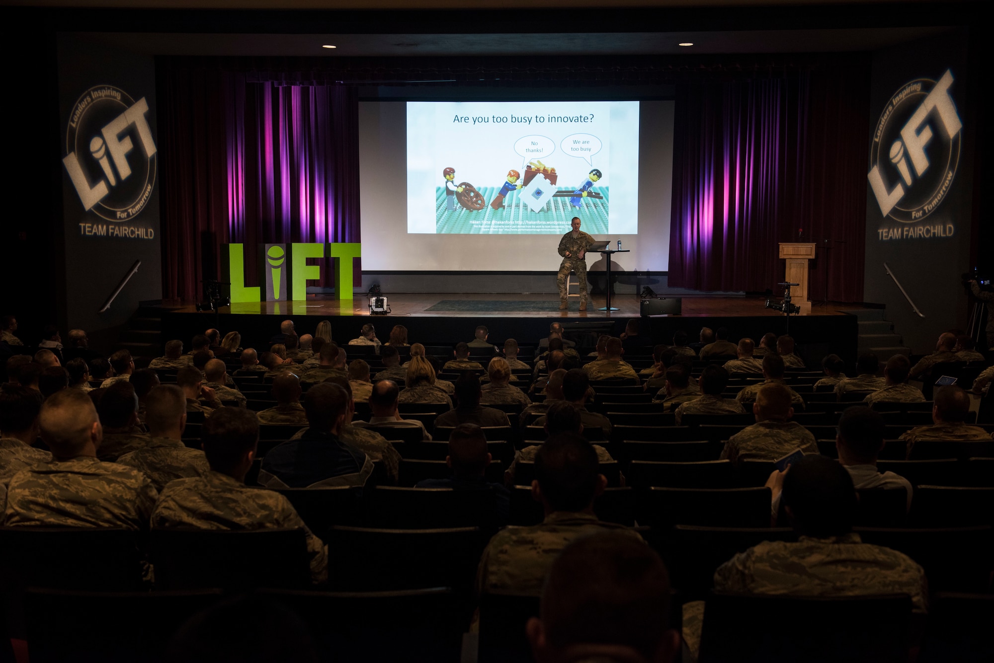 U.S. Air Force Maj. Mark Watson, 92nd Operations Group chief of training, speaks during the 2019 Leaders Inspiring for Tomorrow summit in the base theater at Fairchild Air Force Base, Washington, April 19, 2019. The 2019 LIFT summit shifted its focus from its 2018 theme of developing leadership skills, to developing and promoting innovation. (U.S. Air Force photo by Airman 1st Class Lawrence Sena)