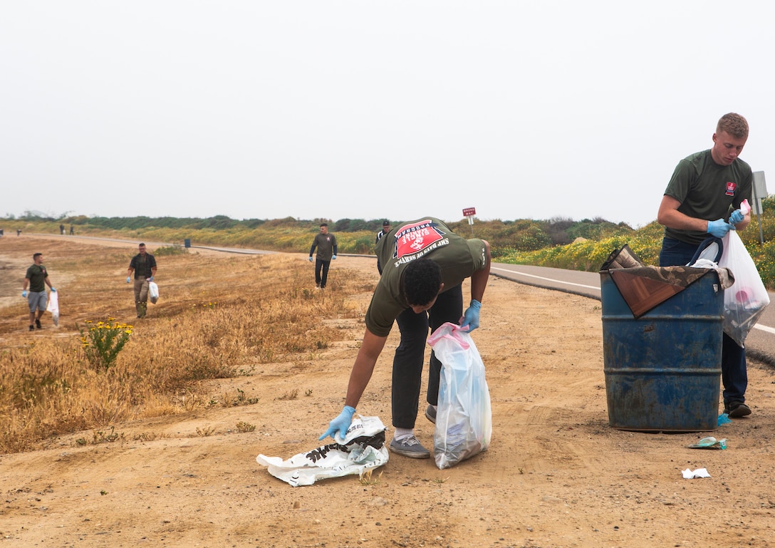 Marines from Marine Corps Air Station Miramar clean and restore Fiesta Island in San Diego, April 24. The Marines came together for the Single Marine Program’s 5th annual “Days of Service” event, which involves Marines going to different locations off of the installation and doing their part in keeping the environment clean. (U.S. Marine Corps photo by Sgt. Becky Cleveland)