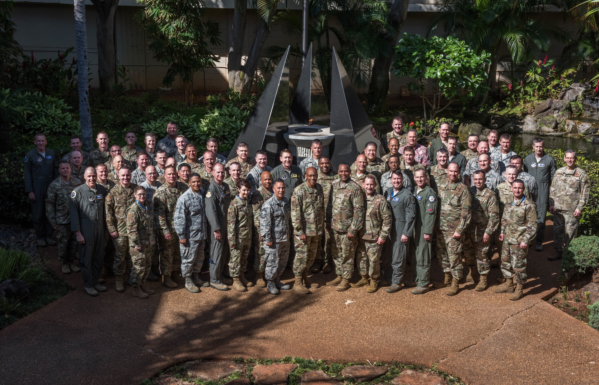 Commanders, Command Chiefs and Directors from across the Pacific Air Forces area of responsibility pose for a photo in the Courtyard of Heroes during the spring commander’s conference at Joint Base Pearl Harbor-Hickam, Hawaii, 18 April 2019. The commander’s conference gave attendees the chance to discuss challenges and opportunities to succeed in an era of great power competition. (U.S. Air Force Photo by Staff Sgt. Hailey Haux)