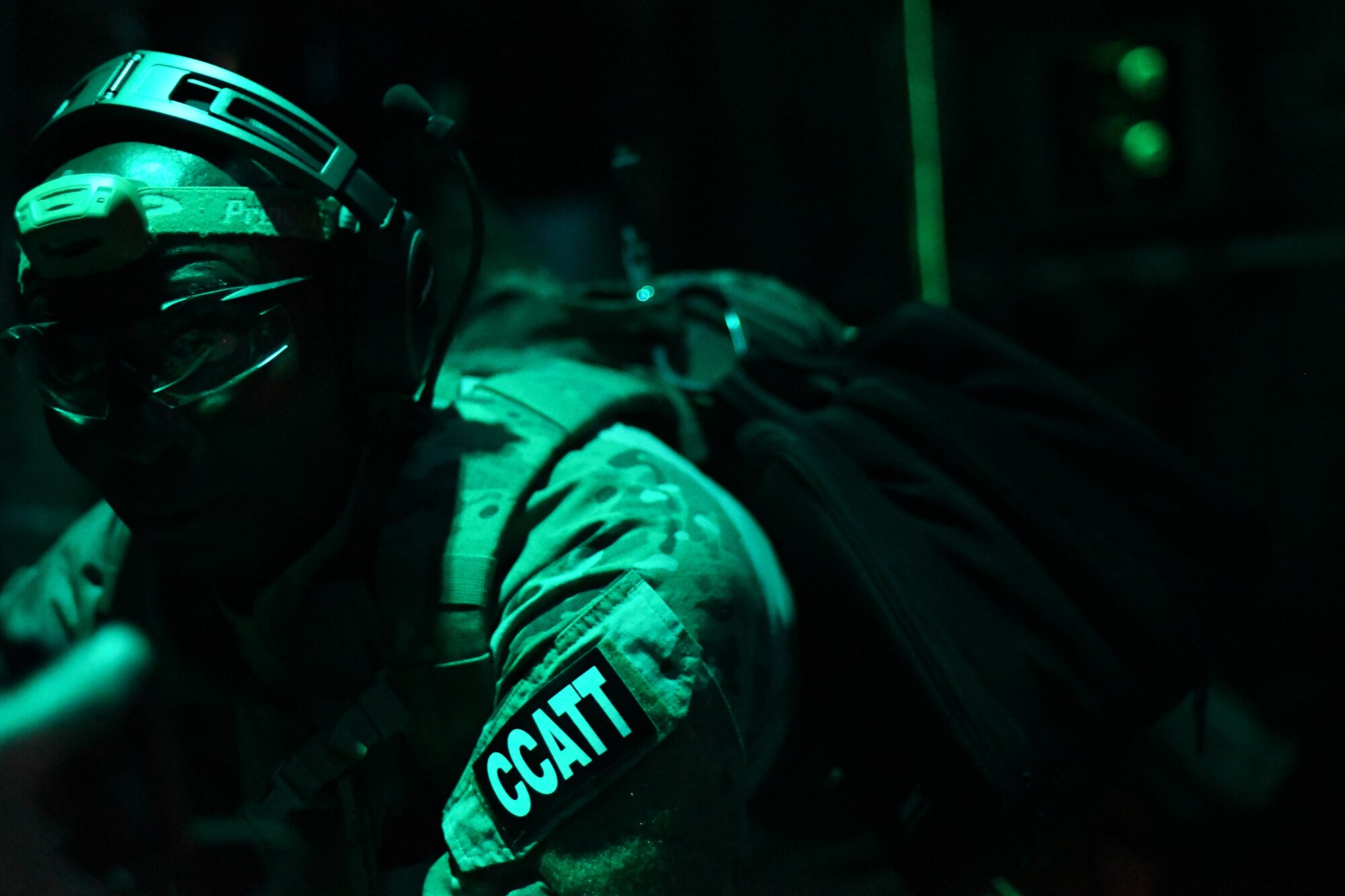 U.S. Air Force Capt. Moses Mhayamaguru, 943rd flight surgeon, prepares medical supplies while in flight during exercise Razor’s Edge, April 17, 2019. During the exercise, combat search and rescue team members honed their skills. (U.S. Air Force photo by Senior Airman Giovanni Sims)