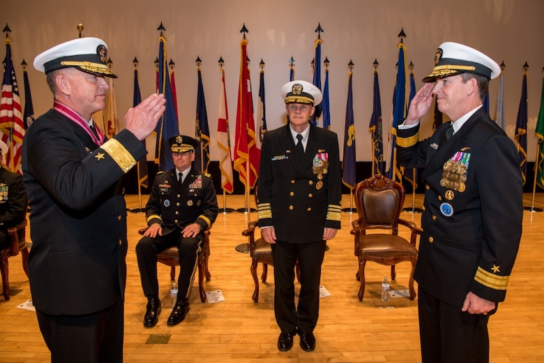 190425-N-TB148-0125 BUSAN, Republic of Korea (April 25, 2019) Rear Adm. Michael P. Donnelly renders a salute to Vice Adm. Phil J. Sawyer, commander, U.S. 7th Fleet, during a change of command ceremony aboard the Republic of Korea (ROK) Fleet base in Busan. Donnelly relieved Rear Adm. Michael E. Boyle to become the 37th commander of U.S. Naval Forces Korea.