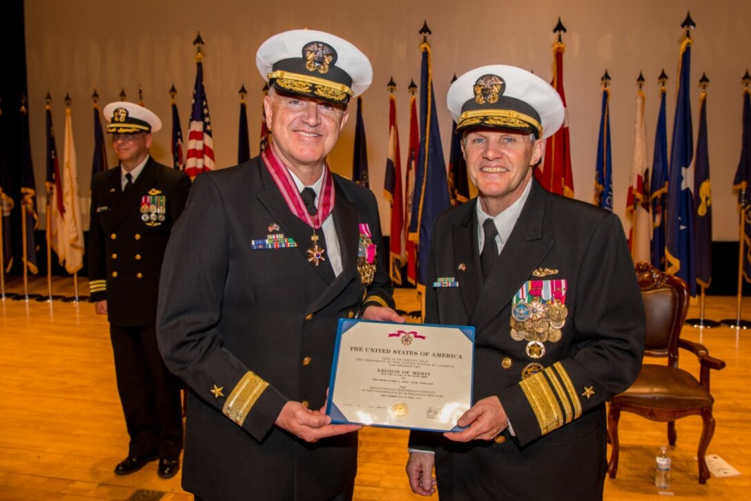 190425-N-TB148-0096 BUSAN, Republic of Korea (April 25, 2019) Vice Adm. Phil J. Sawyer, commander, U.S. 7th Fleet, presents Rear Adm. Michael E. Boyle, commander, U.S. Naval Forces Korea (CNFK), the Legion of Merit during a change of command ceremony aboard the Republic of Korea (ROK) Fleet base in Busan. During the ceremony, Rear Adm. Michael P. Donnelly relieved Boyle to become the 37th CNFK.