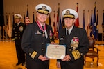 190425-N-TB148-0096 BUSAN, Republic of Korea (April 25, 2019) Vice Adm. Phil J. Sawyer, commander, U.S. 7th Fleet, presents Rear Adm. Michael E. Boyle, commander, U.S. Naval Forces Korea (CNFK), the Legion of Merit during a change of command ceremony aboard the Republic of Korea (ROK) Fleet base in Busan. During the ceremony, Rear Adm. Michael P. Donnelly relieved Boyle to become the 37th CNFK.