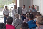 CHUUK, Federated States of Micronesia (April 25, 2019) His Excellency President Peter Christian, president of the Federated States of Micronesia, recognizes U.S. Army Spc. Rally Gilmete from Pohnpei, Micronesia, U.S. Navy Information Systems Technician 2nd Class KN Nethon from Uman, Micronesia, and U.S. Army Sgt. Joseia Lemari, a Xavier High School graduate, during the closing ceremony aboard the Military Sealift Command expeditionary fast transport ship USNS Brunswick (T-EPF 6), strengthening strategic partnerships during Pacific Partnership 2019.