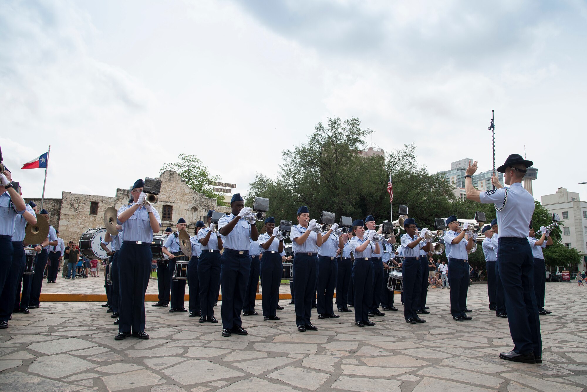 Joint Base San Antonio-Lackland Drum and Bugle Corps, comprised of JBSA-Lackland basic military trainees, perform during San Antonio’s Fiesta Air Force Day at the Alamo, April 22, 2019. From its beginning in 1891, Fiesta has grown into an annual celebration that includes civic and military observances, street and river parades, exhibits, pilgrimages and memorials.