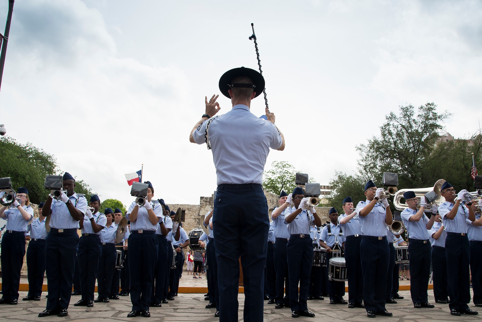 Joint Base San Antonio-Lackland Drum and Bugle Corps, comprised of JBSA-Lackland basic military trainees, perform during San Antonio’s Fiesta Air Force Day at the Alamo, April 22, 2019. From its beginning in 1891, Fiesta has grown into an annual celebration that includes civic and military observances, street and river parades, exhibits, pilgrimages and memorials.